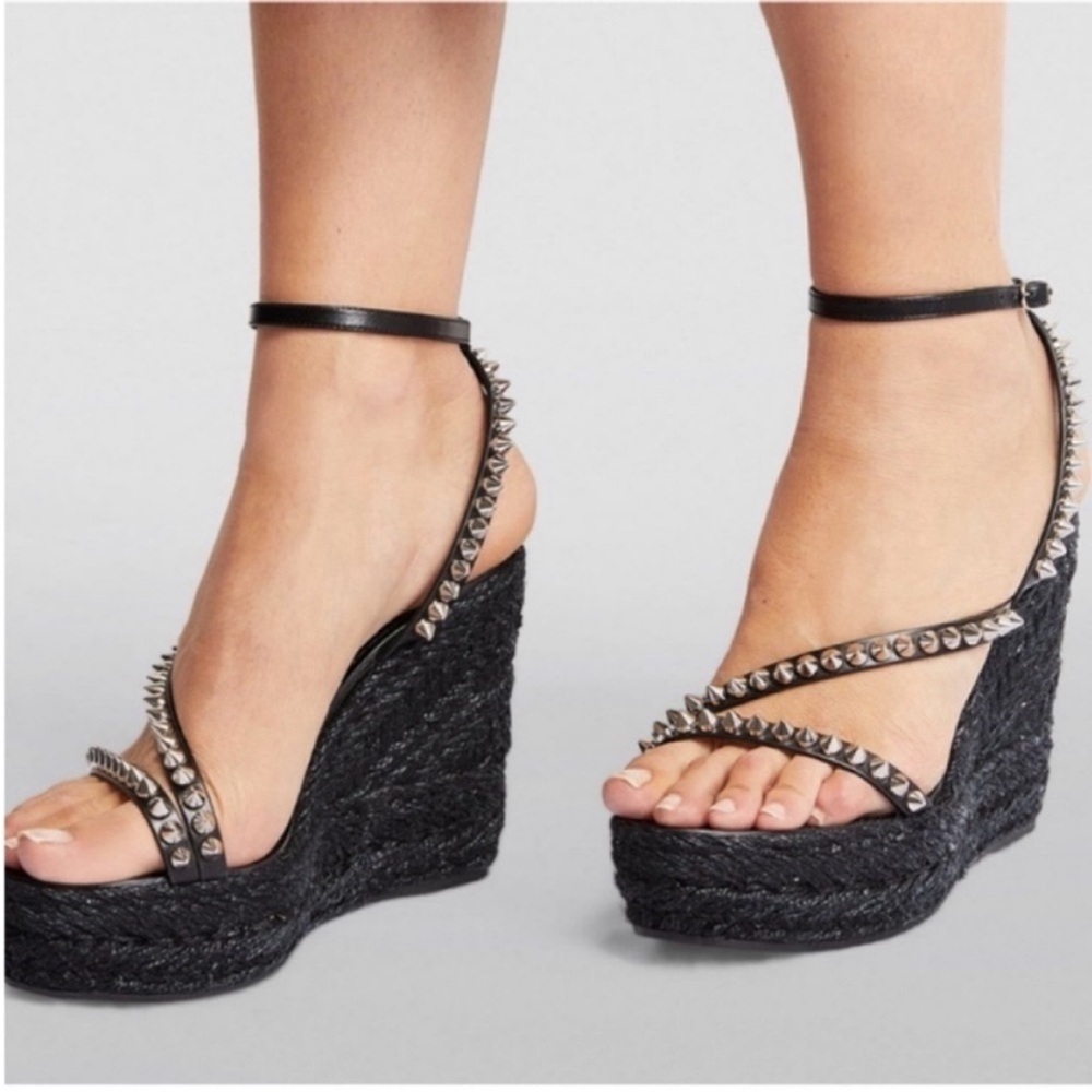 Christian Louboutin Malfaldina Studded wedges
RETAIL 795